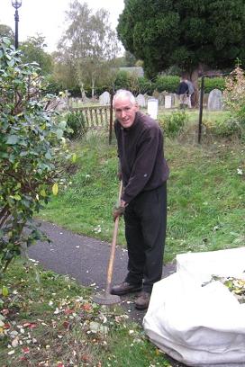 Peter Jones at work in the churchyard