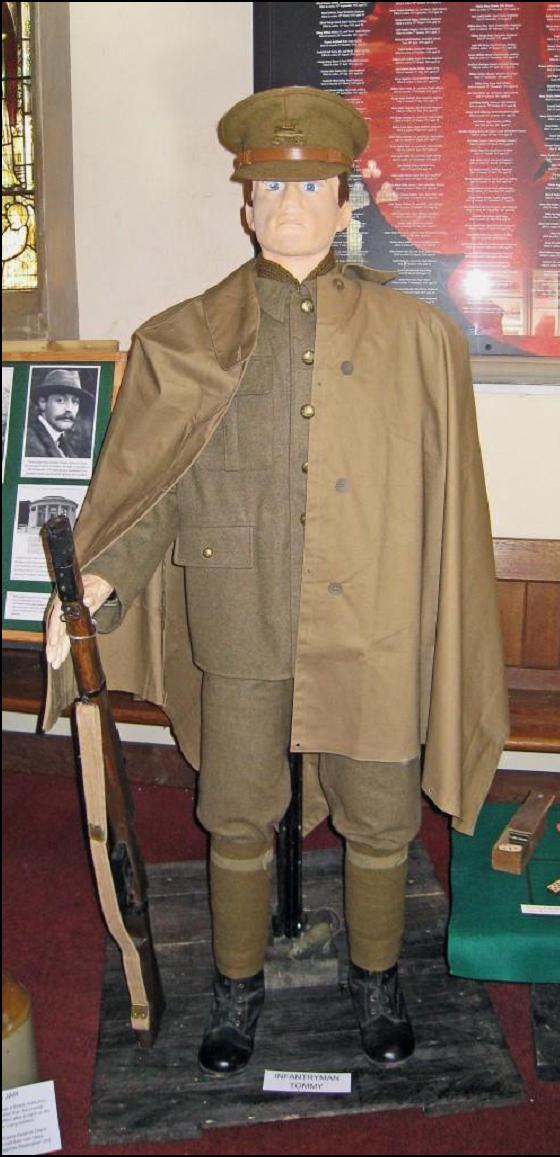 A WW1 soldier standing at ease