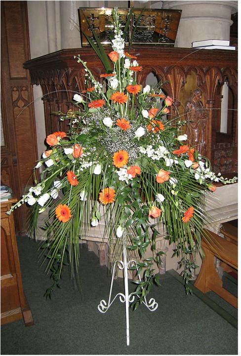 A pedestal of flowers at Holy Trinity church