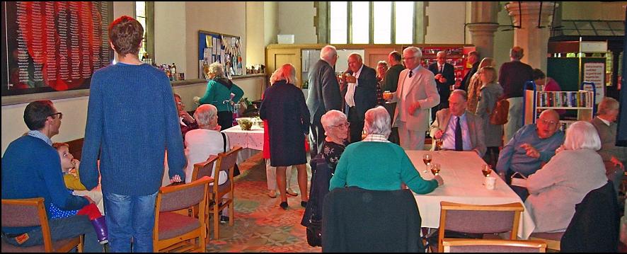 A group of diners celebrating at the Harvest Festival lunch